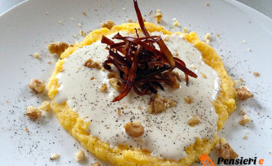 Polenta con fontina noci e mela