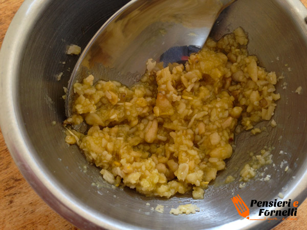 Costine di agnello con salsa di arancia e pinoli